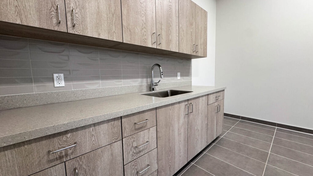 Versatile commercial kitchen space with modern fixtures for industrial use.