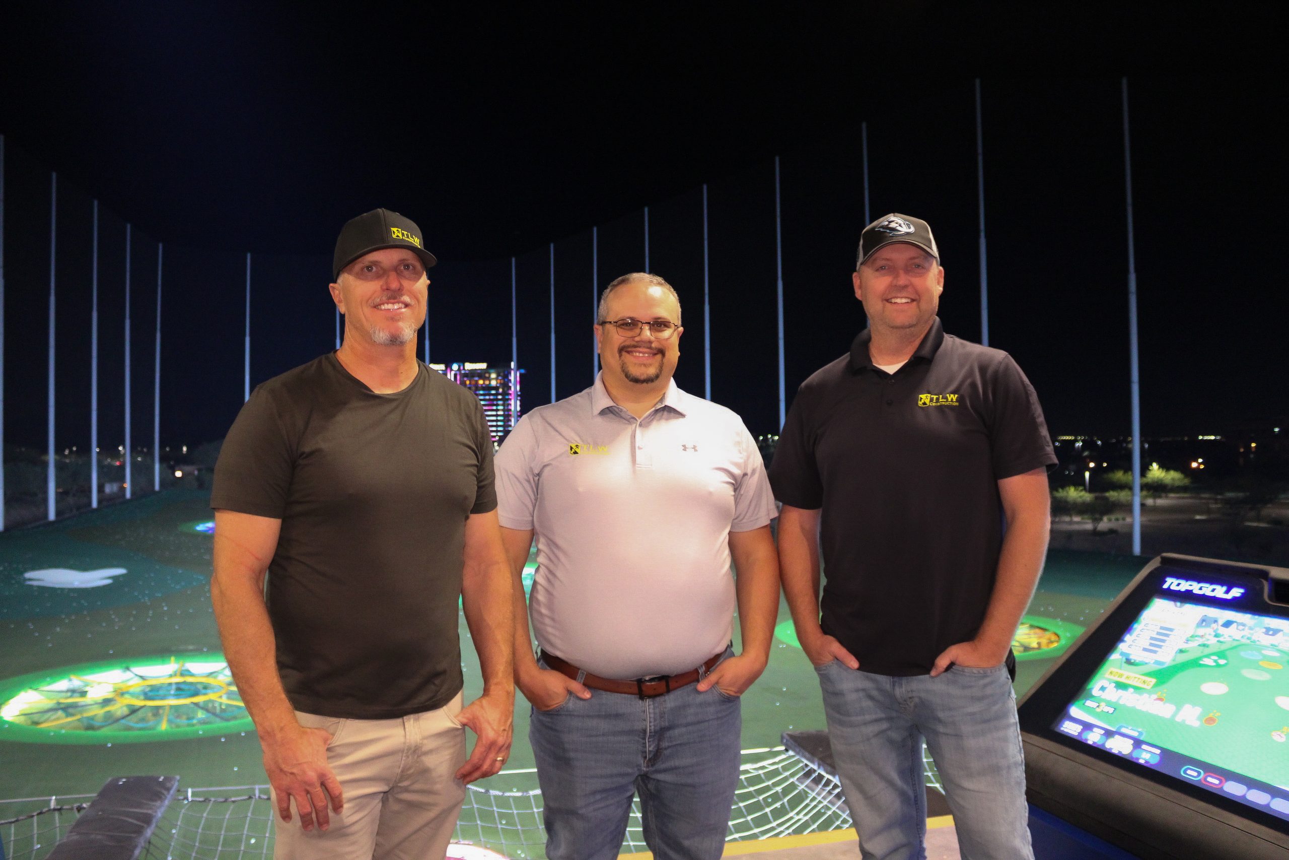 Topgolf night in Scottsdale with TLW Construction team members enjoying a fun evening.